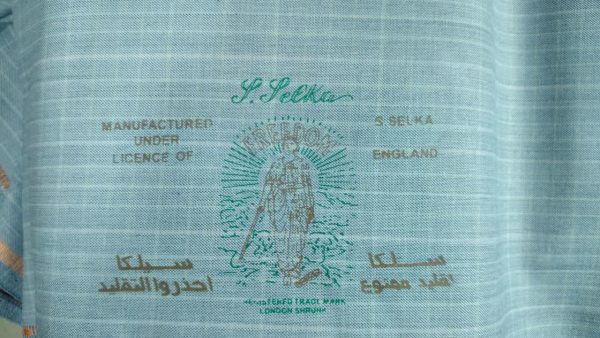 پارچه کت و شلواری مطهری گرم بالا   65-35 فیروزه ای - کالا قسط آرام