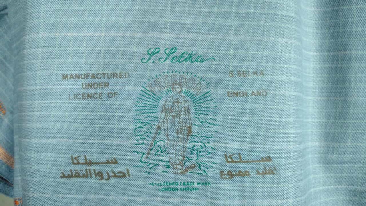 پارچه کت و شلواری مطهری گرم بالا   65-35 فیروزه ای - کالا قسط آرام